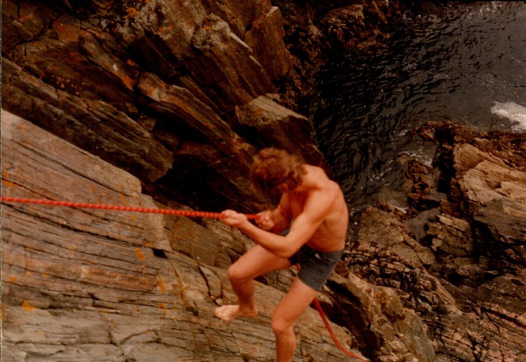 Des Keena abseiling into Prawn Zawn 1977